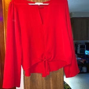 Red blouse with v-neck design